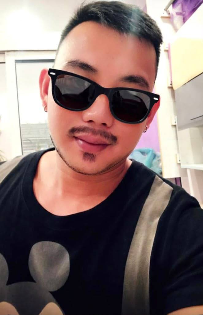Owner-supplied portrait wearing sunglasses
